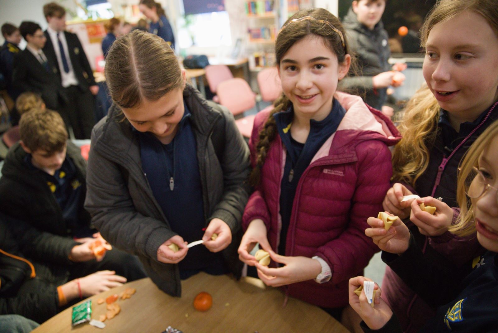 students enjoying school library lunar new year event